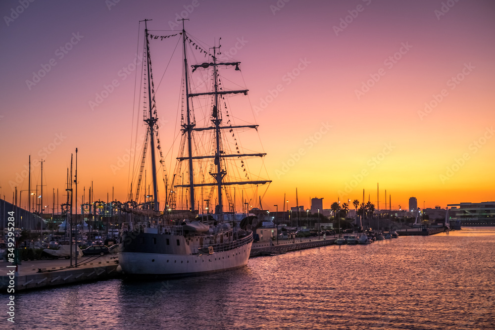 Valencia harbor, Sunset marina port Spanish city nautical scene warm red colors