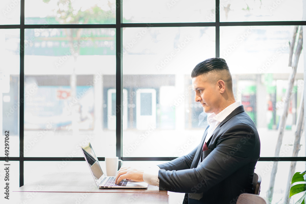 Business people show satisfaction with their work. Businessman celebrating a good job in Co Working space. Business people show satisfaction with their work. Businessman celebrating a good job in Co Working space.
