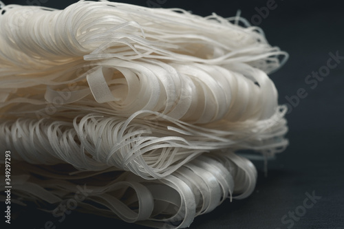 Raw Rice Noodles on black background