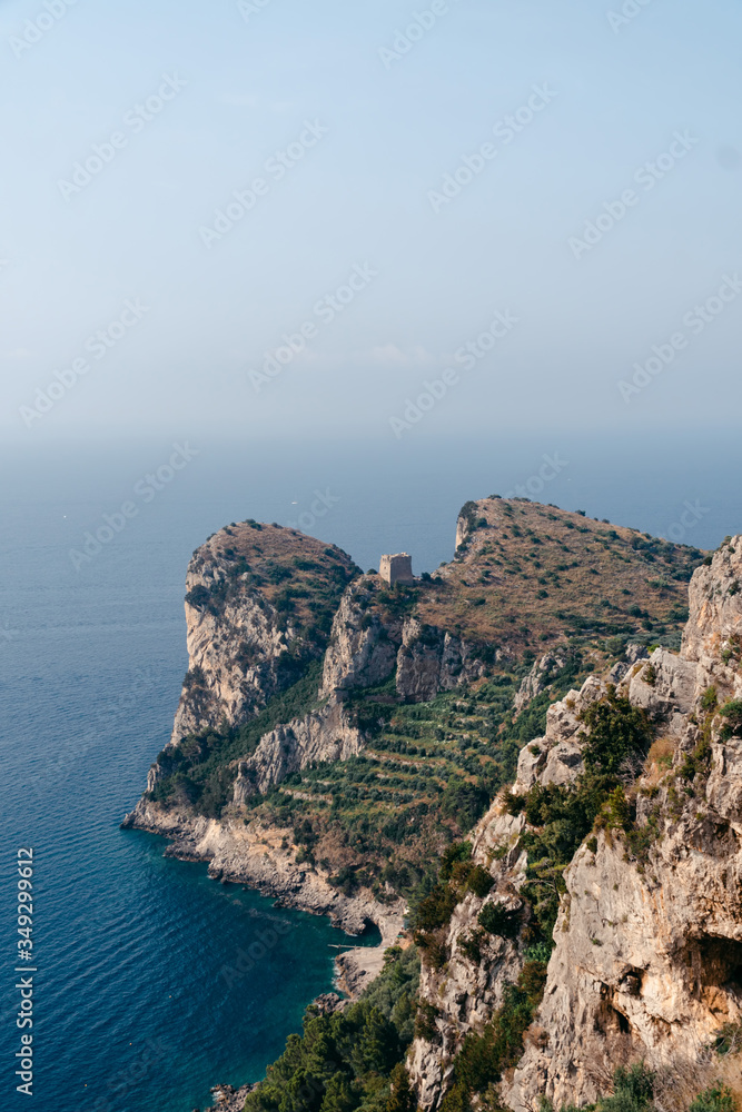 Mountain laces, which stands on the bay of Nerano of Massa Lubrense, vertical photo