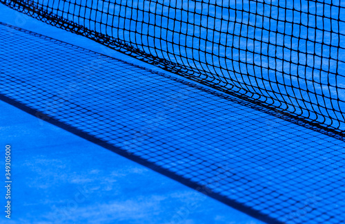 Tennis net and blue court. Individual sport. Blue filter.. © Augustas Cetkauskas