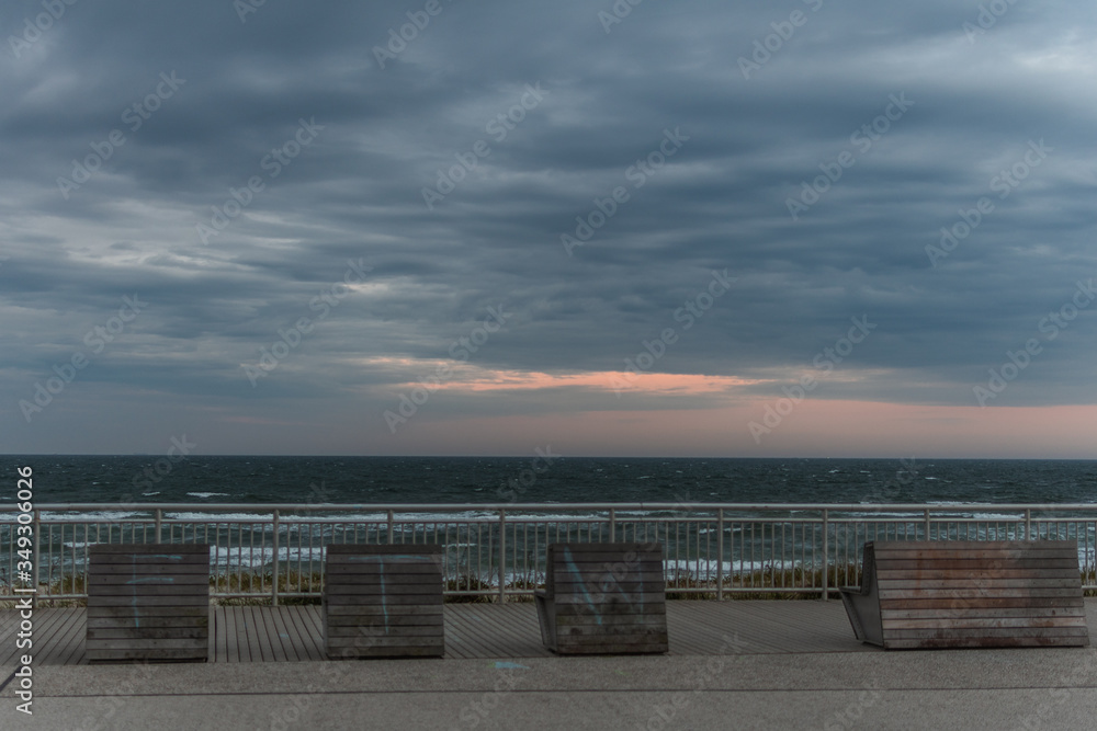 Empty Rockaway Beach at sunset in Queens, New York City in May 2020