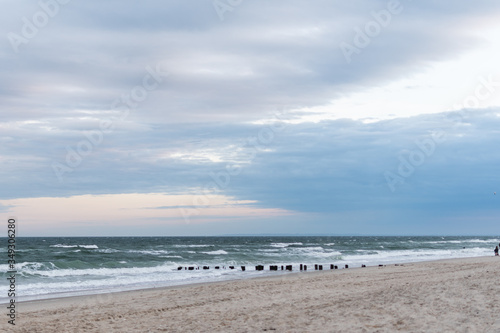 Canvas Print Empty Rockaway Beach at sunset in Queens, New York City in May 2020