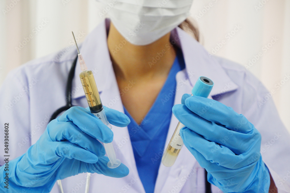 Female doctor working in laboratory for testing on vaccine for pandermic covid19 Female doctor working in laboratory for testing on vaccine for pandermic covid19