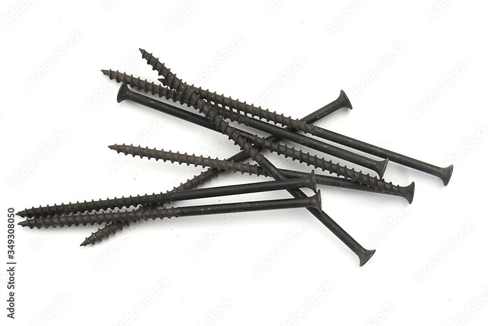 Metal screws, iron screws, wood screws isolated on white backgro Metal screws, iron screws, wood screws isolated on white backgro