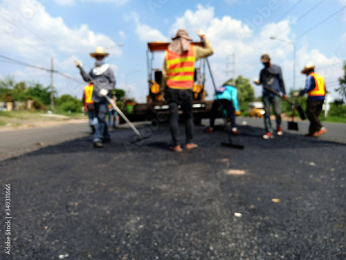 Image blurred road maintenance work