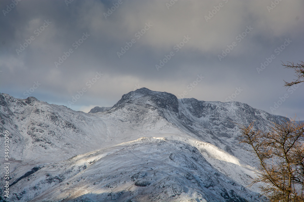 Langdale Valley and Fells, English lake district under full snow cover on a sunny winter day