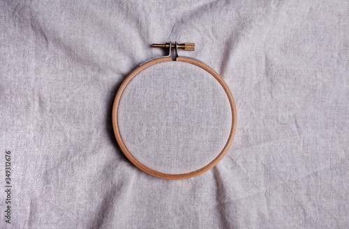 embroidery hoop with inserted cotton natural fabric