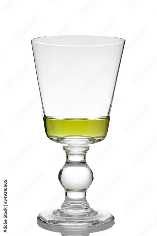 Neat green absinthe drink in a glass Neat green absinthe drink in a glass