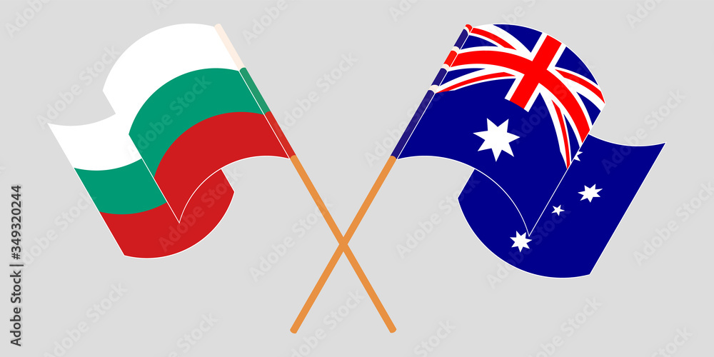 Crossed and waving flags of Bulgaria and Australia