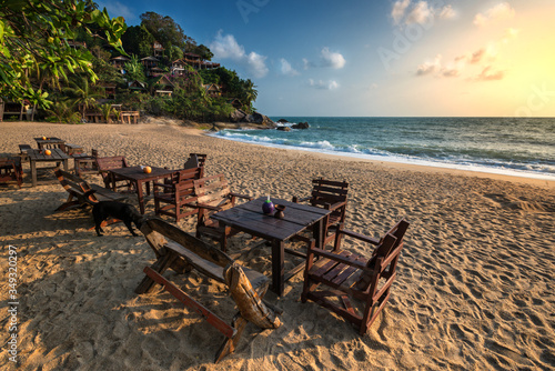 .incredible beauty and paradise Haad Than Sadet Beach with azure sea and golden sand on the island of Ko Pha-ngan in Thailand with a fabulous hilltop village and cafe on the beach © Alexeiy