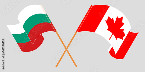 Crossed and waving flags of Bulgaria and Canada