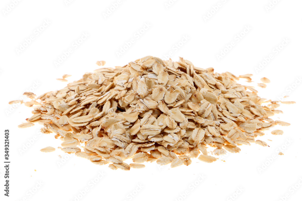 Oat flakes, uncooked oats in bowl with poon and wheat ears on white background. Concept of healthy eating, vegan food, healthy food, breakfast. Oat flakes, uncooked oats in bowl with poon and wheat ears on white background. Concept of healthy eating, vegan food, healthy food, breakfast.