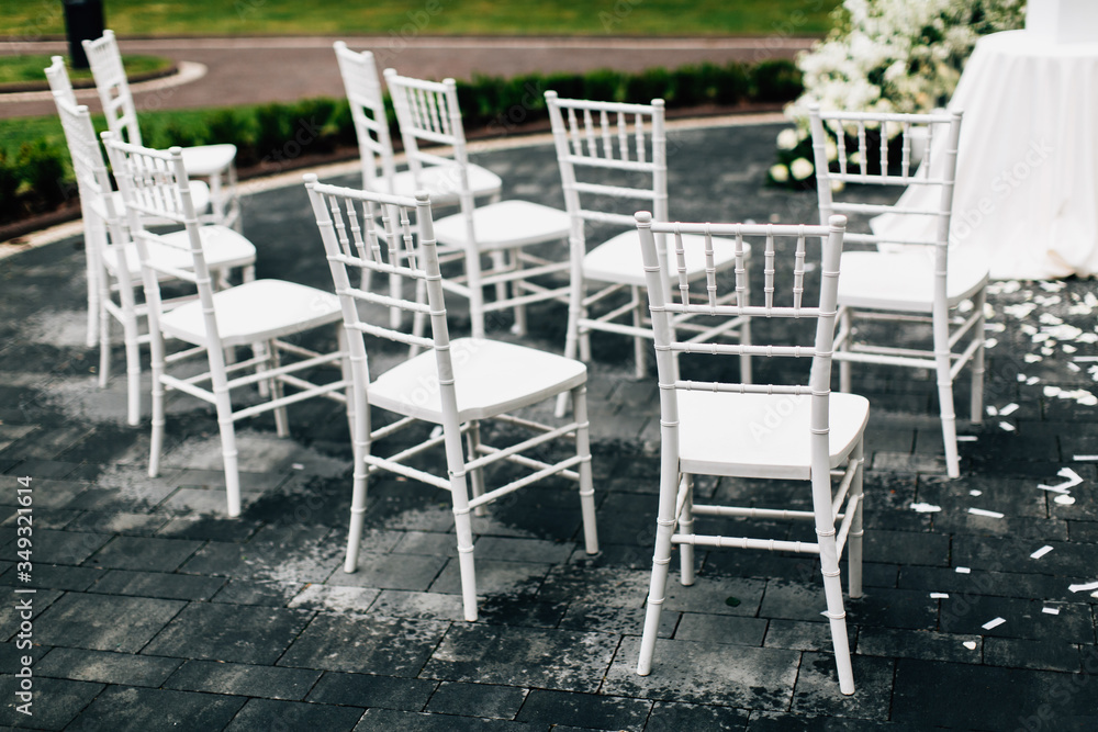 White chairs for wedding ceremony
