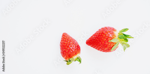 Fresh juicy strawberries isolated over white blackground