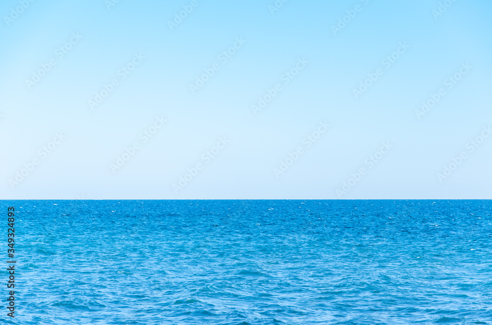 Seascape background vivid blue sea and clear sky Seascape background vivid blue sea and clear sky