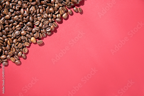Coffee beans on a red background