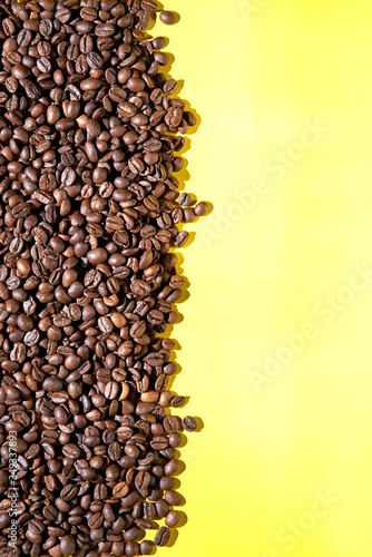 Coffee beans on a yellow background