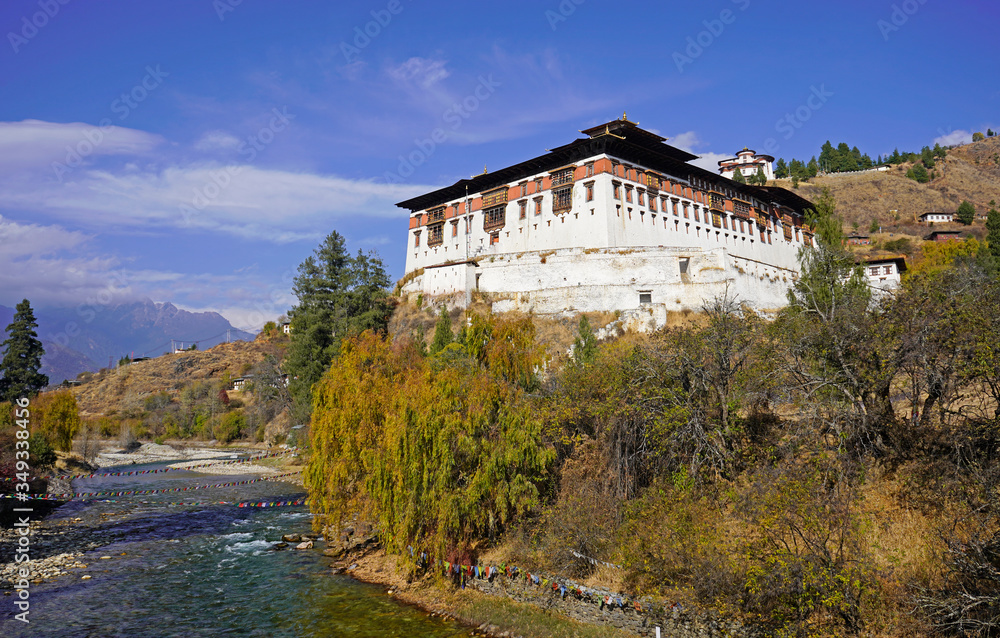 Paro Dzong, river, trees and mountains, Bhutan Paro Dzong, river, trees and mountains, Bhutan