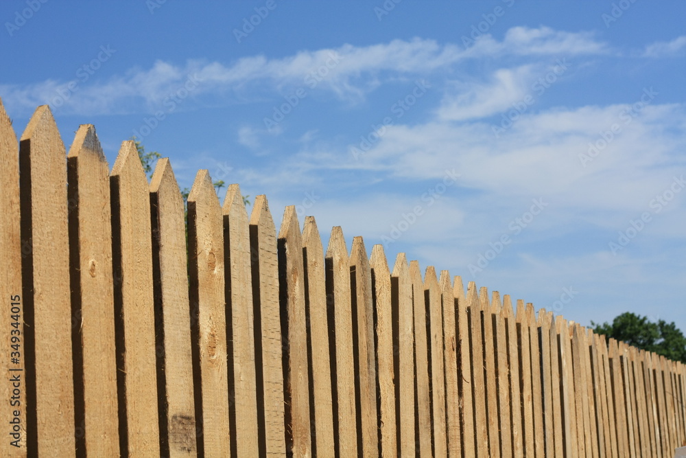 Obraz premium wooden fence on blue sky