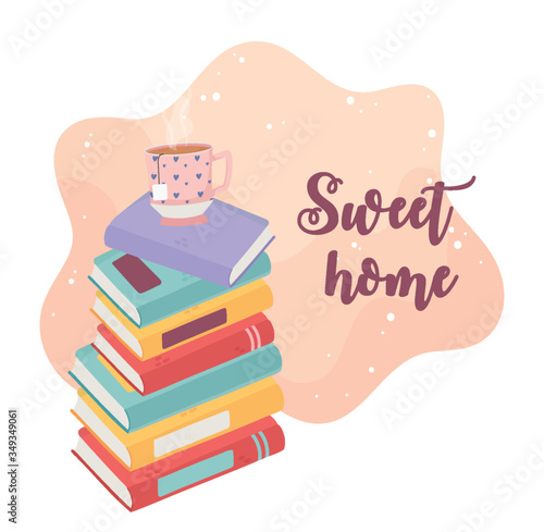 sweet home stack of books and tea cup decoration