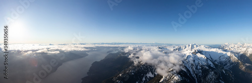 Aerial Panoramic View of Remote Canadian Mountain Landscape during sunny morning. Located near Vancouver  British Columbia  Canada. Nature Panorama Background. Authentic