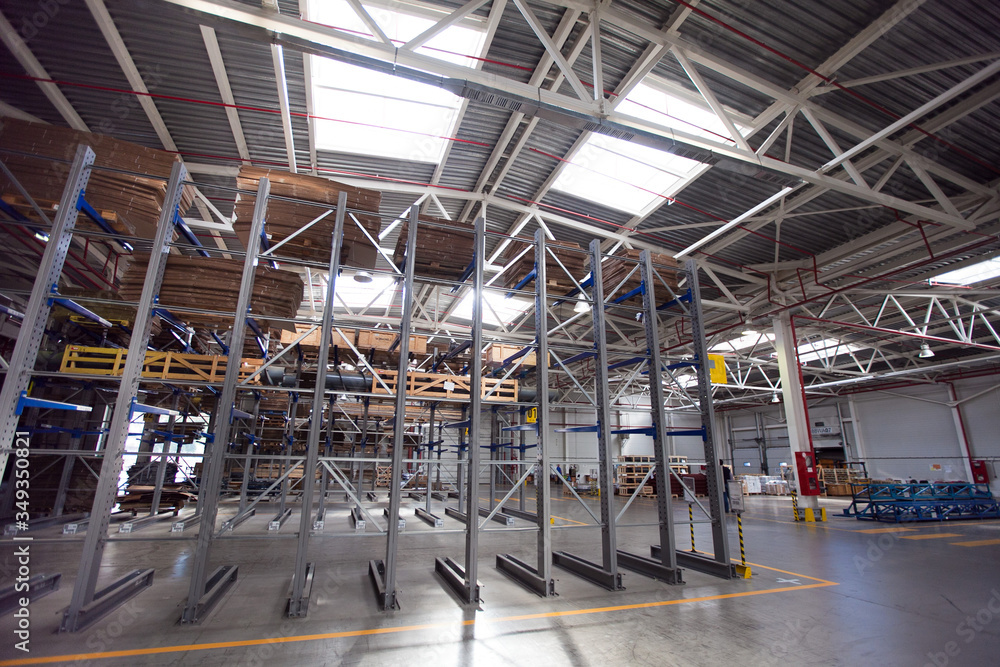 Large Industrial Warehouse of heavy iron and metal parts. Large Industrial Warehouse of heavy iron and metal parts.