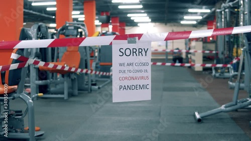 Wallpaper Mural Closing notice hanging on a warning tape in the gym Torontodigital.ca