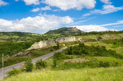 Road that crosses the ridge of the badlands to get to Perticara photo