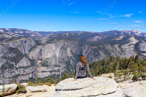 Woman at Peak after climbing in Yosemite National Park California