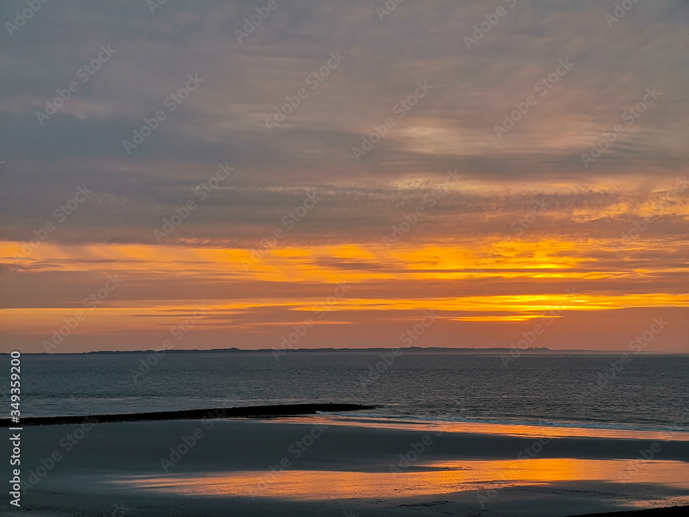 Awe sunset from Norderney behind juist
