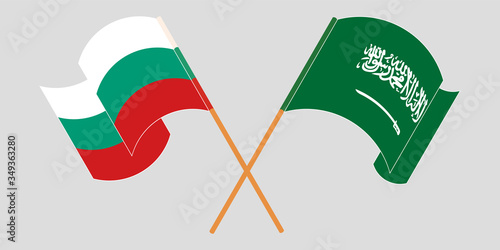 Crossed and waving flags of Bulgaria and the Kingdom of Saudi Arabia