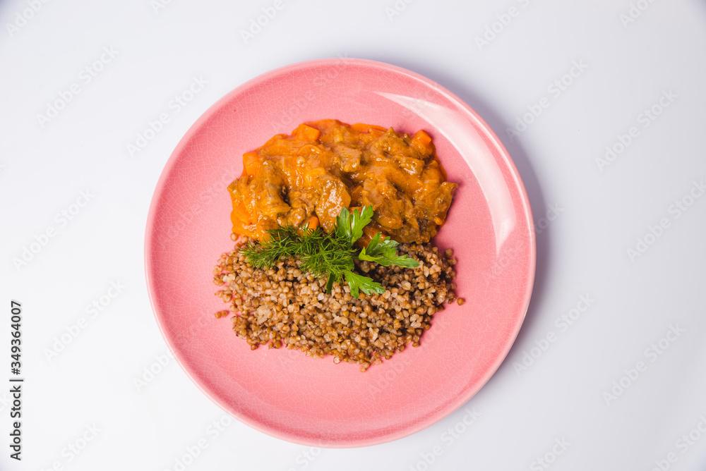 Meat goulash with buckwheat and mint leaves Meat goulash with buckwheat and mint leaves