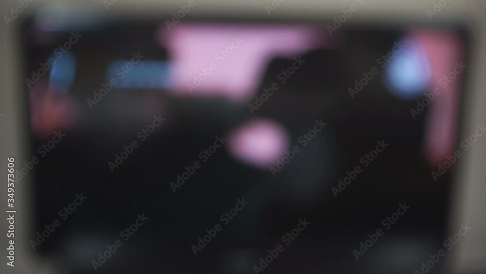 Hand switches telecasts using the remote control. Hand switches telecasts using the remote control.