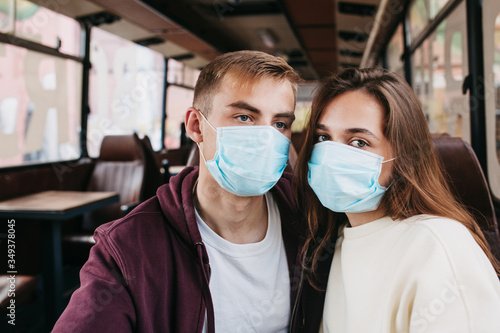 young couple is sitting at home on self-quarantine.
