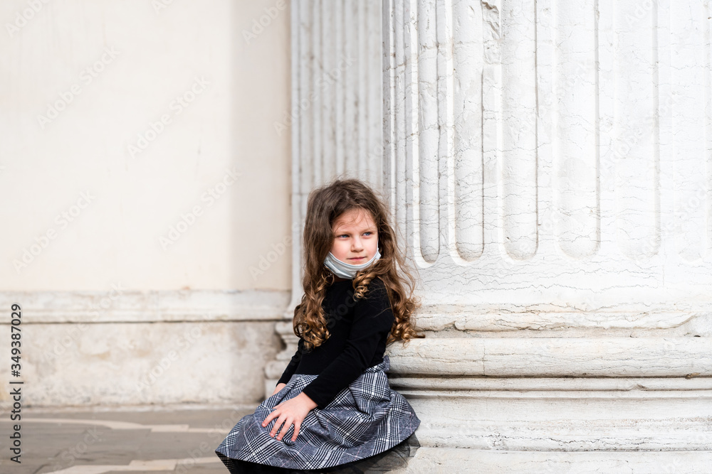 portrait of a cute little girl after the lockdown for coronavirus in Venice Italy