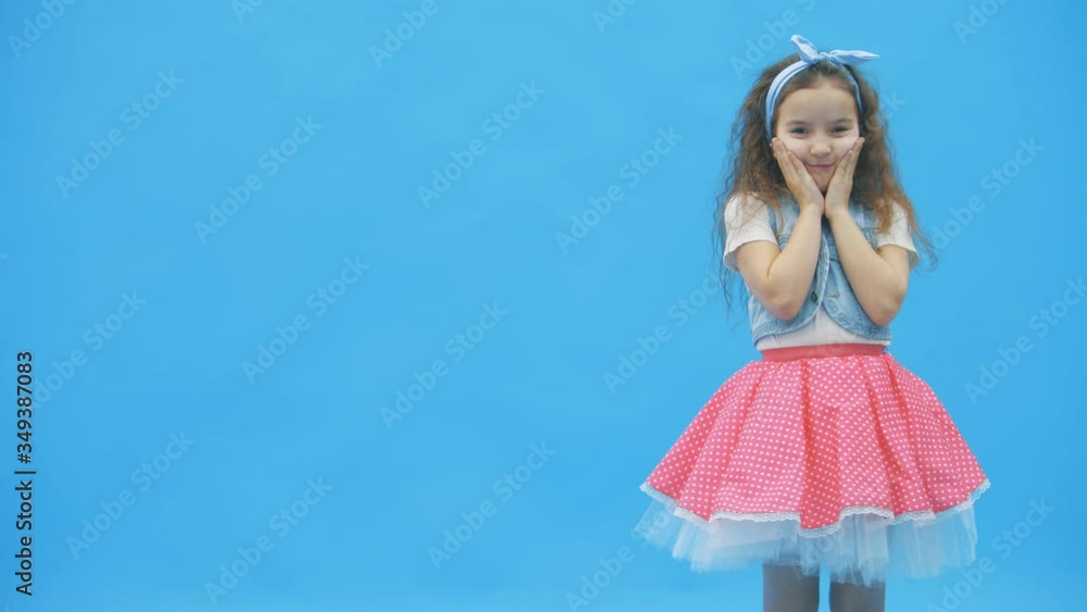 4k slow motion video where well dressed girl is posing for a photo. 4k slow motion video where well dressed girl is posing for a photo.