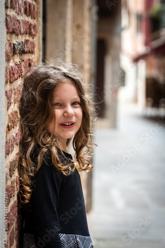 portrait of a cute little girl after the lockdown for coronavirus in Venice Italy