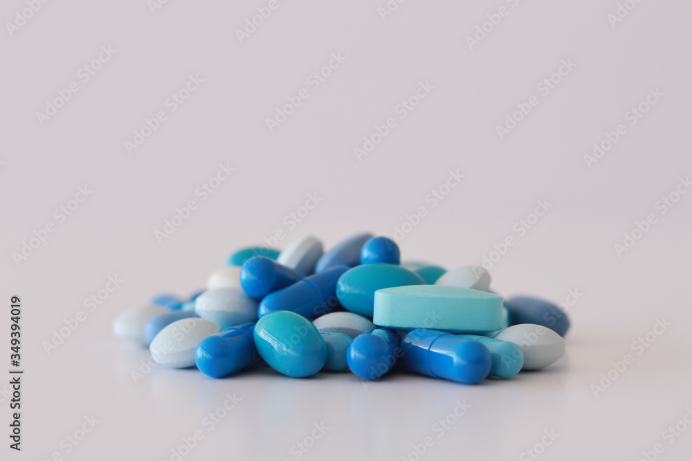 Bunching of blue medicines white background