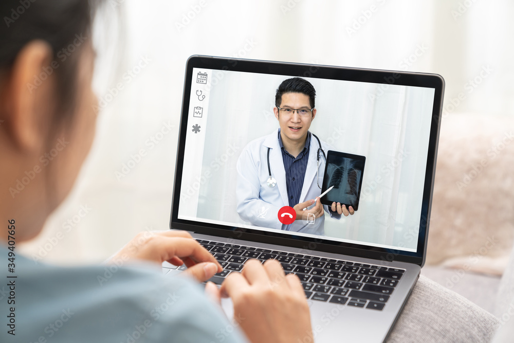 Asian chinese doctor video conference call online talking for follow up remotely with medical coronavirus result at home. Online healthcare digital technology service, counselor and internet support. Asian chinese doctor video conference call online talking for follow up remotely with medical coronavirus result at home. Online healthcare digital technology service, counselor and internet support.