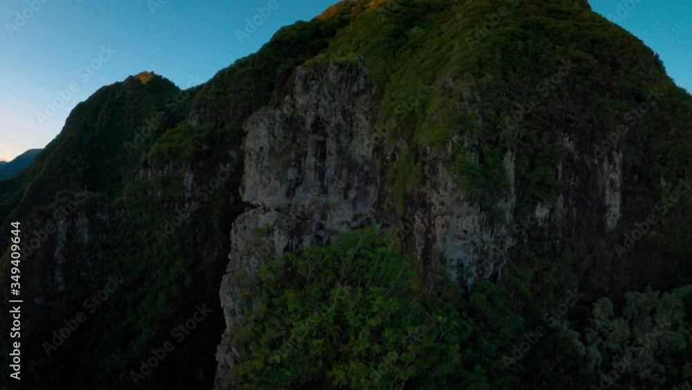 Aerial FPV Race Drone Flying Down Epic Jungle Mountain Backwards at Extreme Speed Aerial FPV Race Drone Flying Down Epic Jungle Mountain Backwards at Extreme Speed