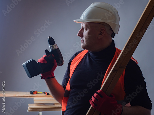 Builder with a screwdriver ...