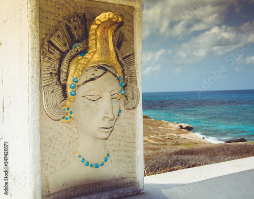 Punta Sur, Isla Mujeres / Mexico
Entrance of Mayan archaeological site,
Ixchel sculpture, the mayan goddess of the moon, the wife of the Sun, considered the god of fertility with great healing power photo