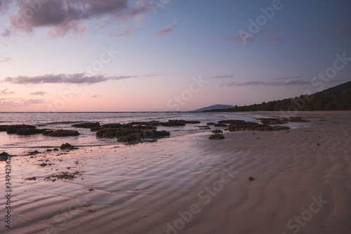 Wallpaper Mural Beautiful orange sunrise over the ocean in far north Queensland, white sandy beach Torontodigital.ca