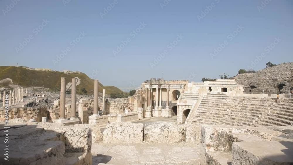 Ancient hall, coliseum background, Israel, clear sky, traveling shot Ancient hall, coliseum background, Israel, clear sky, traveling shot