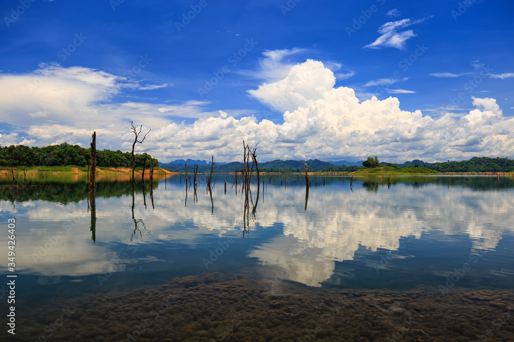 Reservoir and lake in sunny day with clouds and blue sky background, For use agriculture and industry