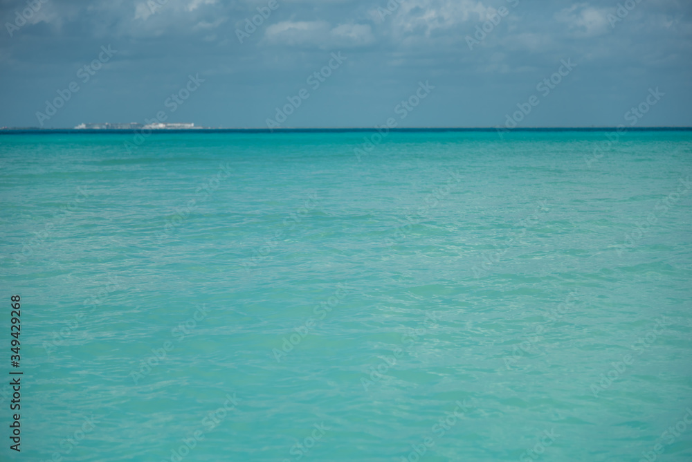 Beautiful turquoise clear water of the Caribbean Isla Mujeres Northern beach, Mexico