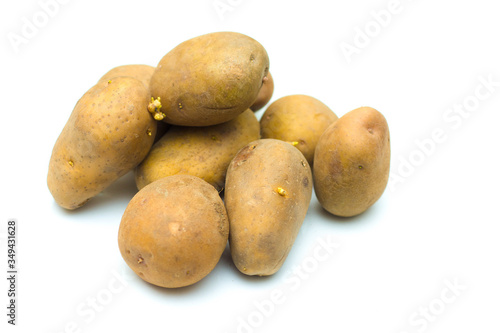 Close up potatoes over white background.