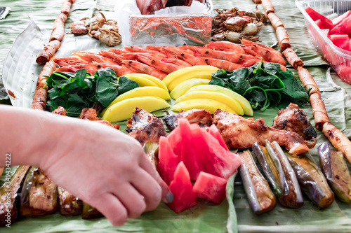 Boodle fight style of eating. A traditional filipino way of eating together with family and friends