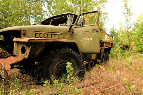 Old soviet military truck car trash in woods near Chernobyl in Prypyat